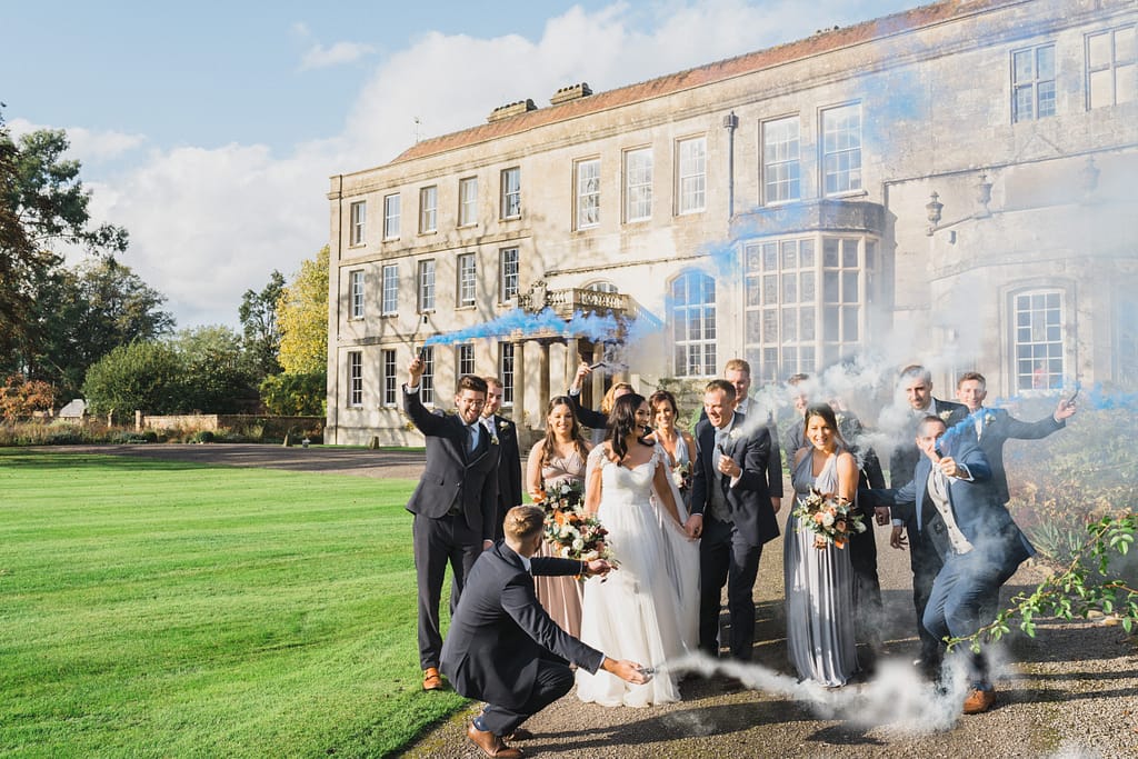 bridal party with smoke bombs Elmore court wedding photography