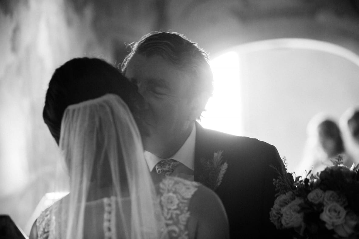 dad kissing bride Gloucestershire wedding photographer 
