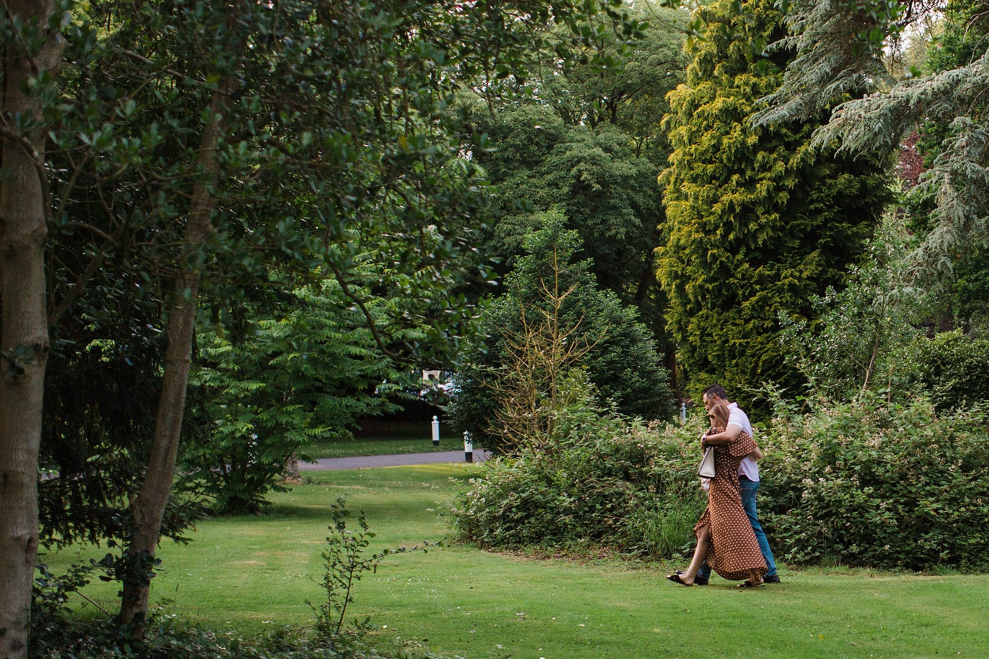 couple walking in Tortworth court garden Gloucestershire photographer
