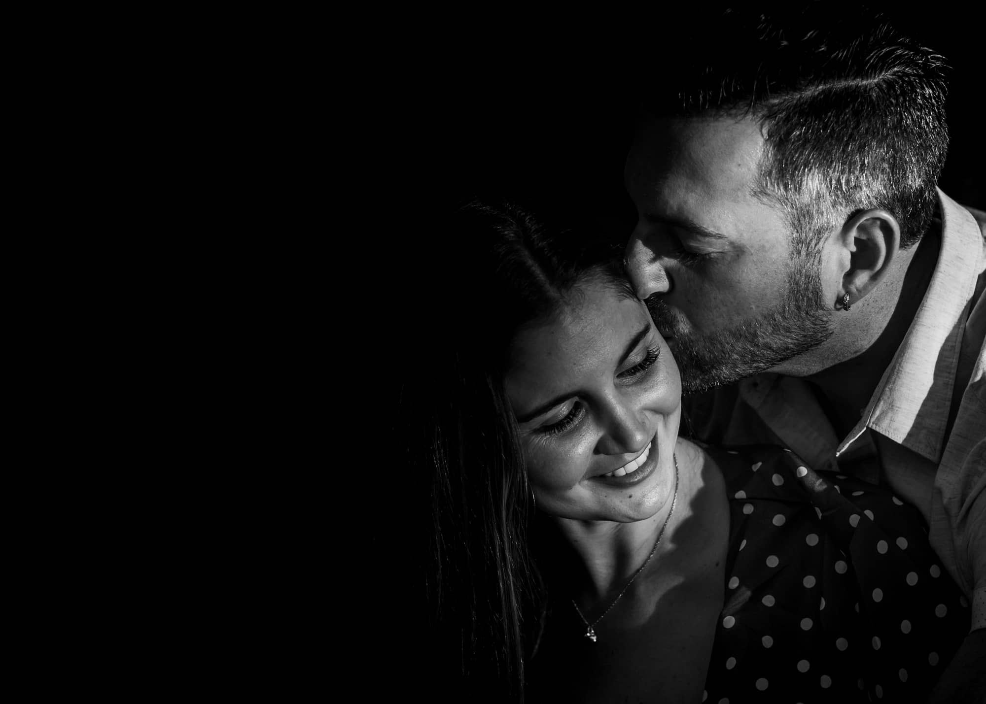 man kisses girls black and white Tortworth court gloucestershire photography 