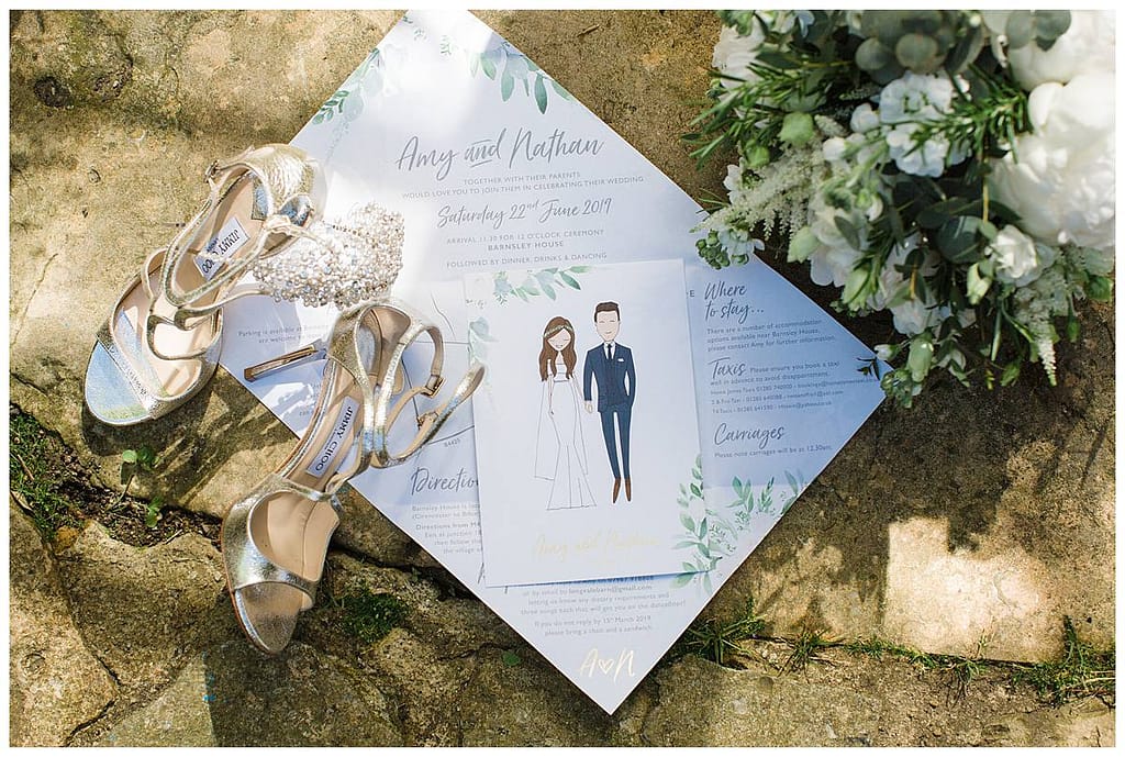 jimmy choo shoes invitation and bouquet flat lay Barnsley house wedding
