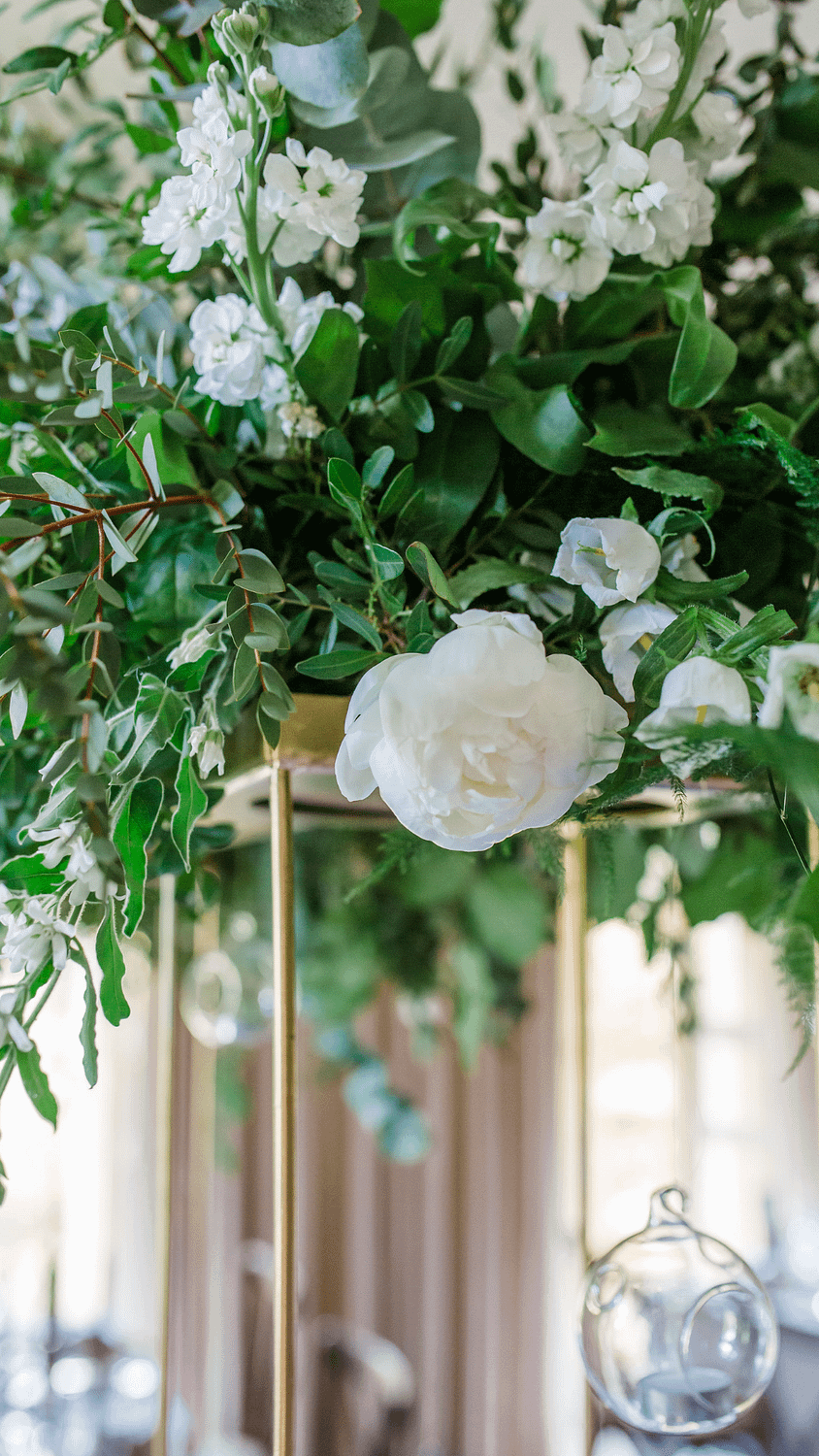 white and green flowers intimate wedding tables gloucestershire photographer