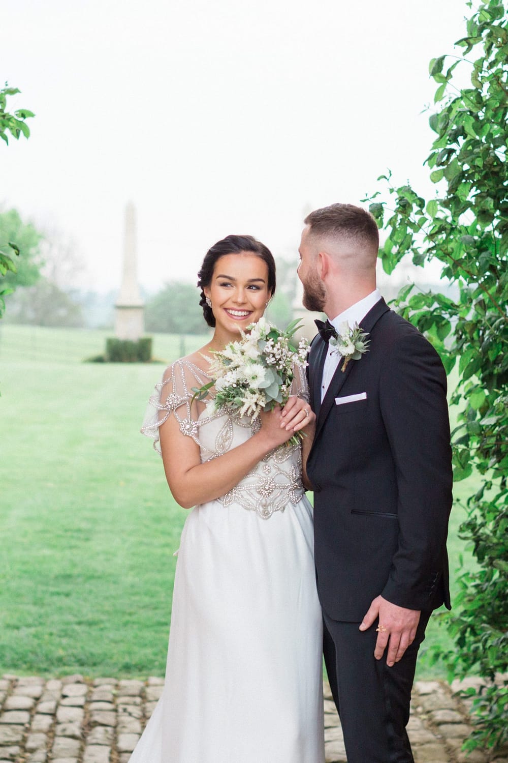bride and groom smiling Euridge Manor may wedding