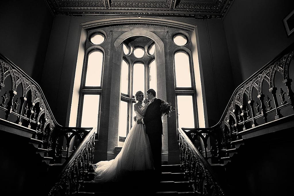 Grittleton house bridal couple on staircase