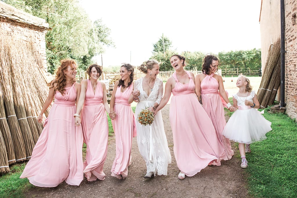 bridal party walking together laughing Bristol photography wedding