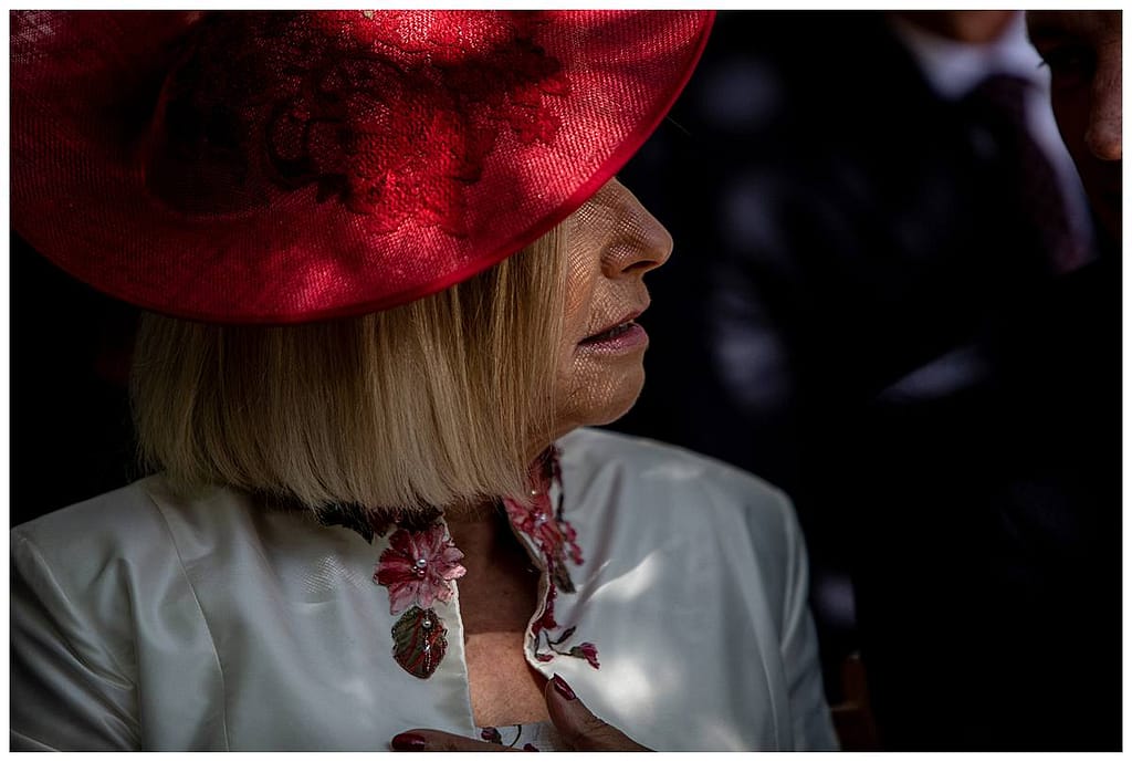 red hat on woman Barnsley House wedding photography