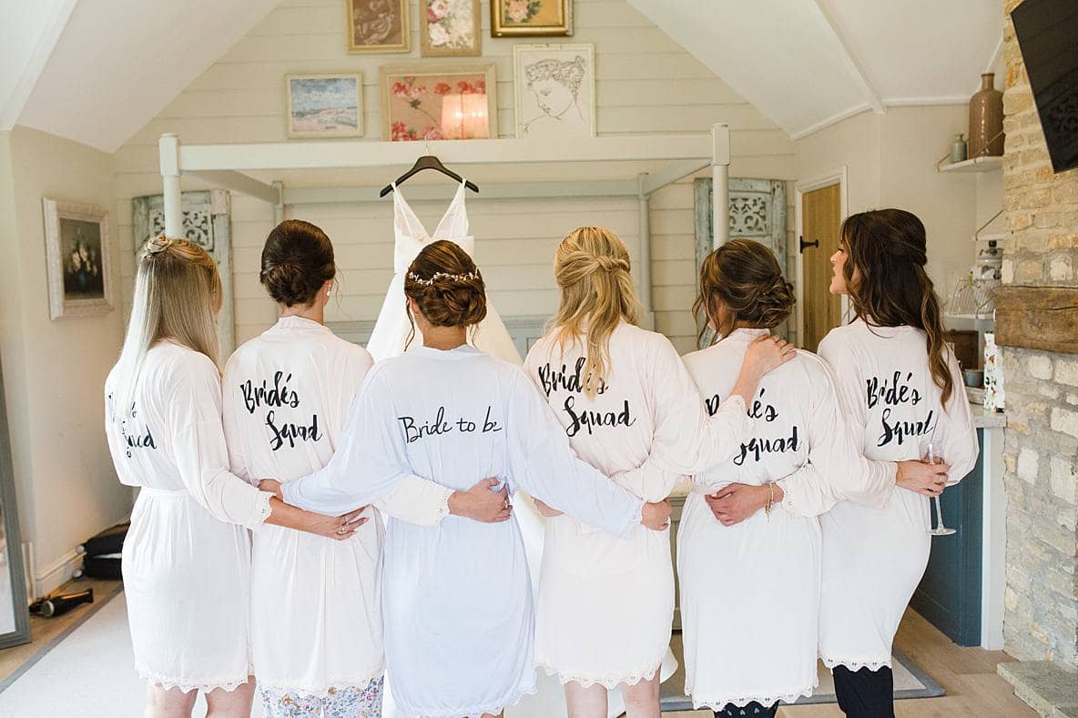 bridesquad wearing dressing gowns cotswold wedding photographer