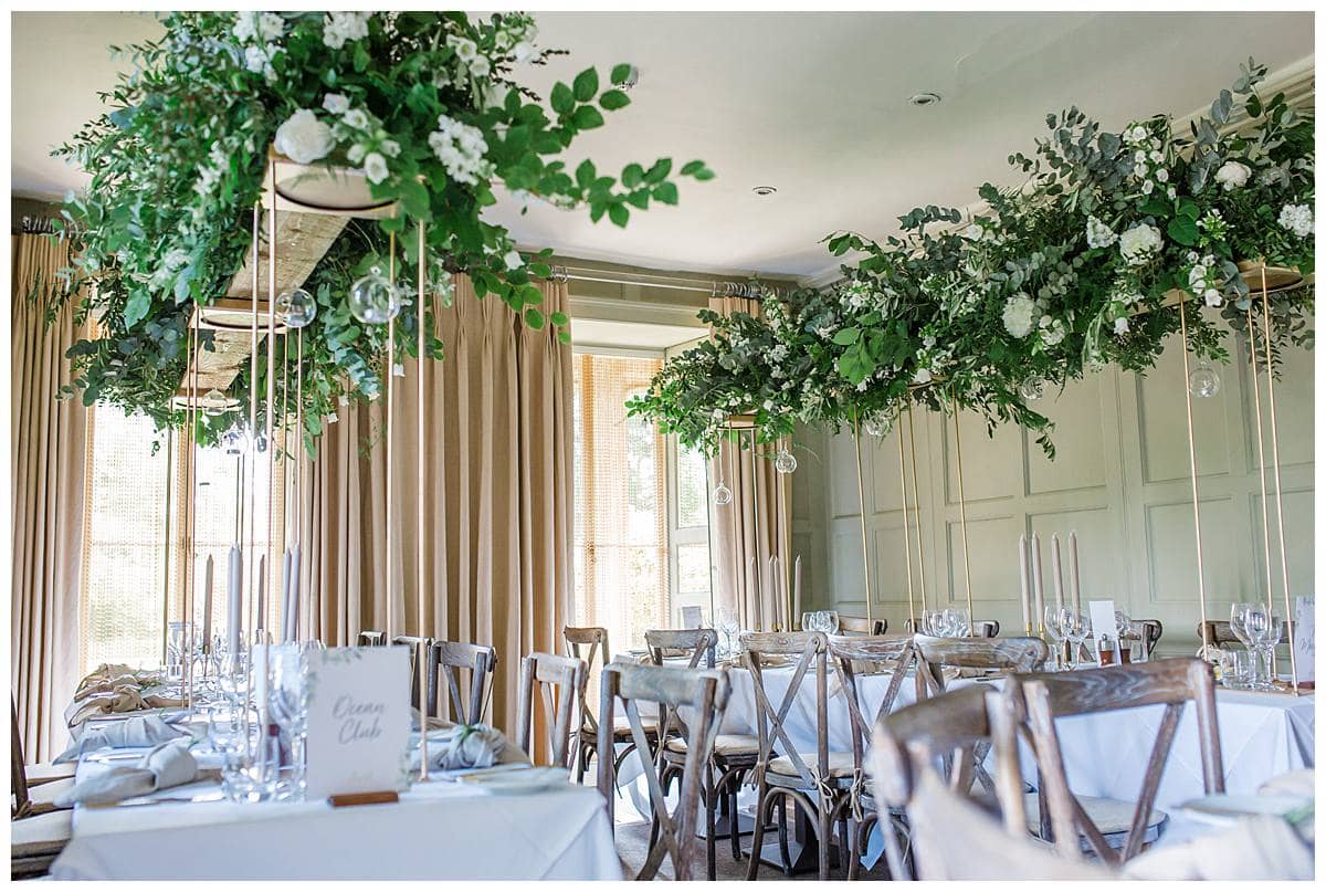 wedding breakfast inside Barnsley House designed by the rose shed photographed by gloucestershire wedding photographer