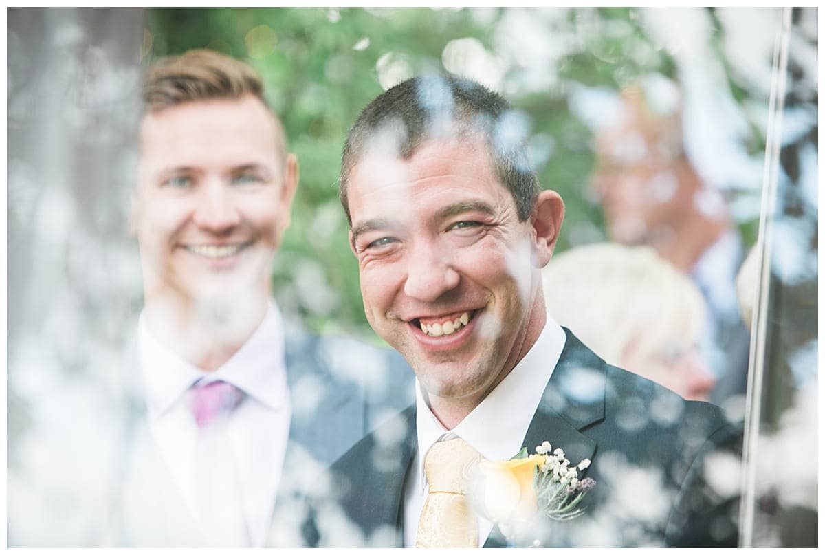 smiling groom gloucestershire wedding photography