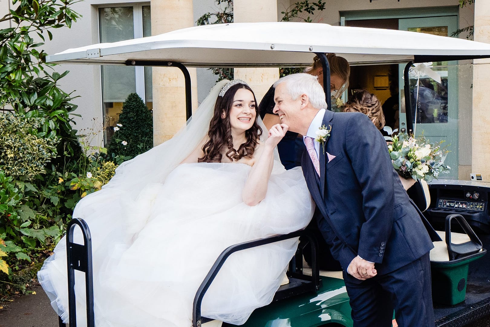 bride and dad with golf cart bowood hotel 
