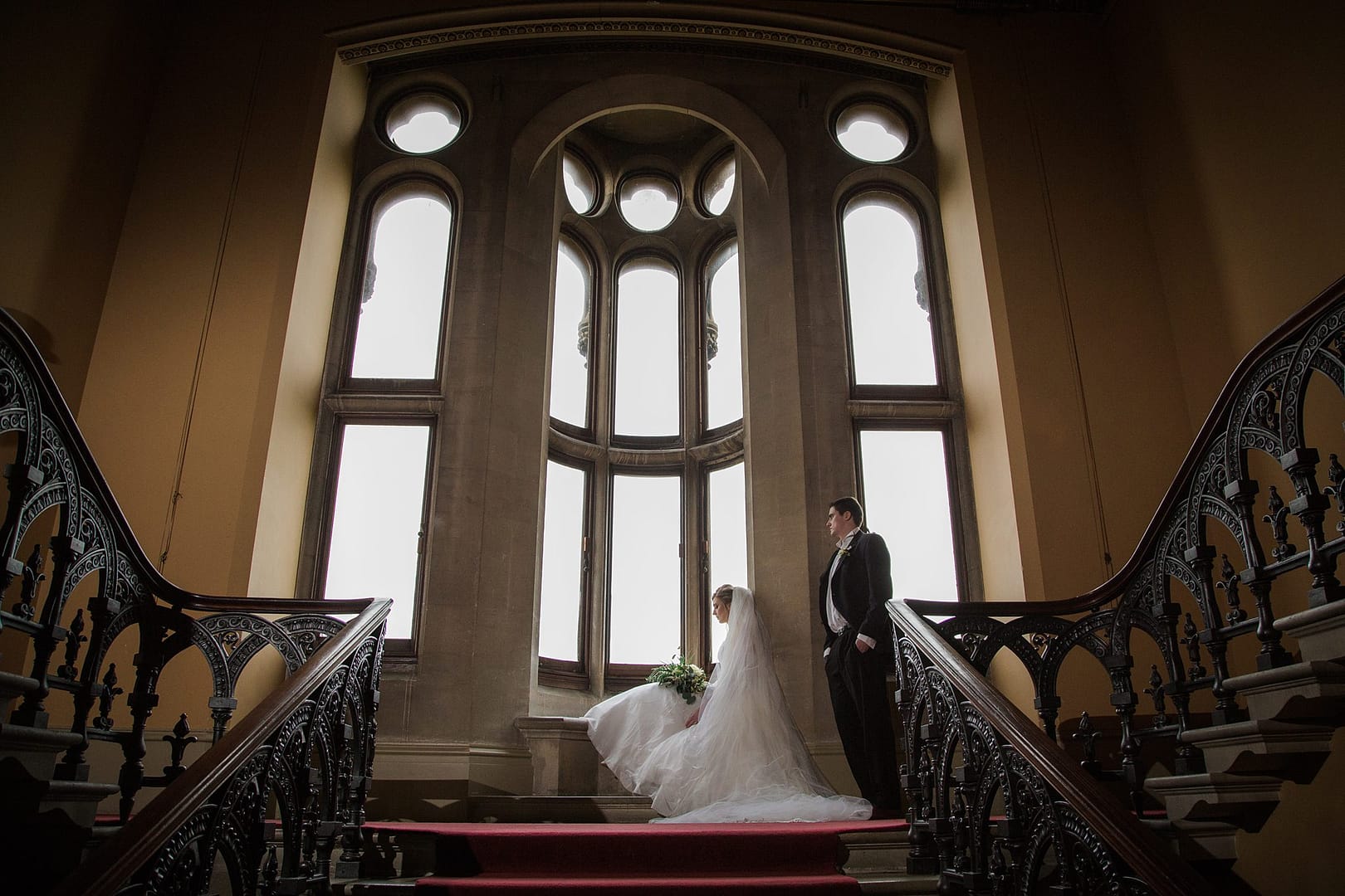 couple on staircase 2 grittleton house wedding photographer