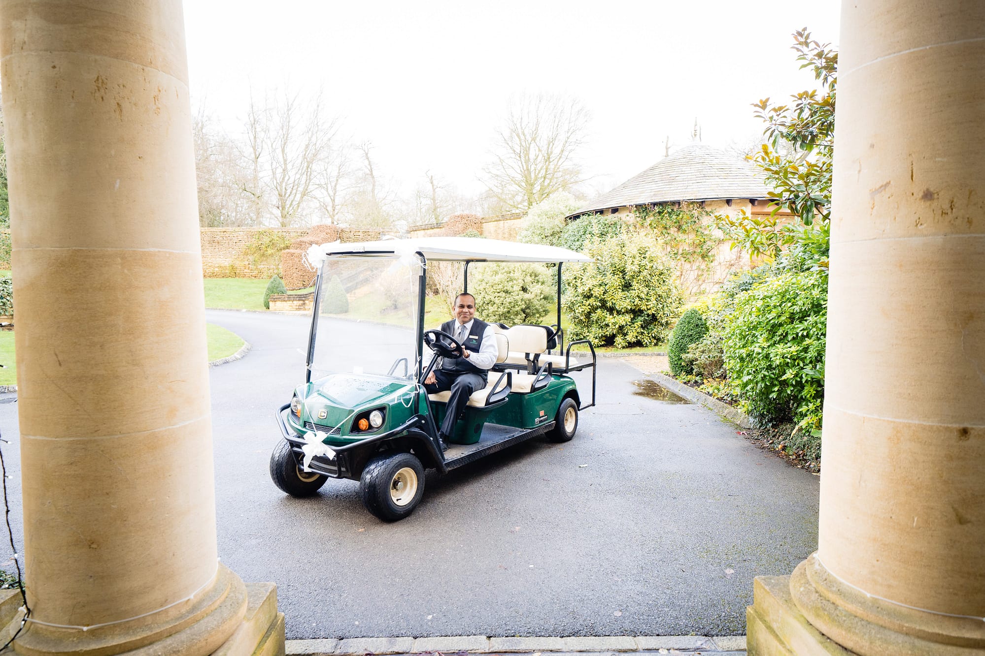 golf cart provide transportation to bride at bowood wiltshire wedding photographer