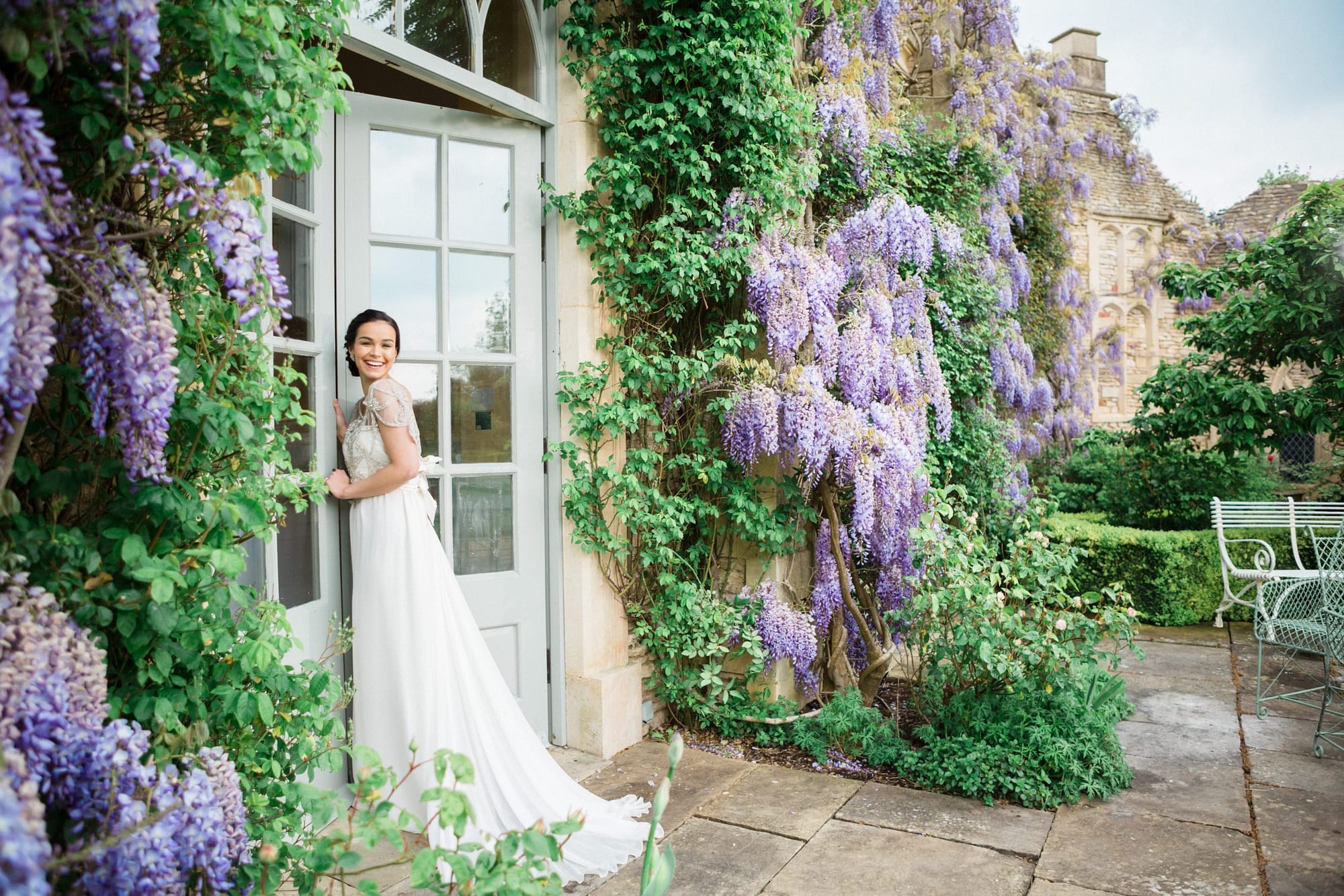 bride in dress by wisteria Euridge Manor may wedding