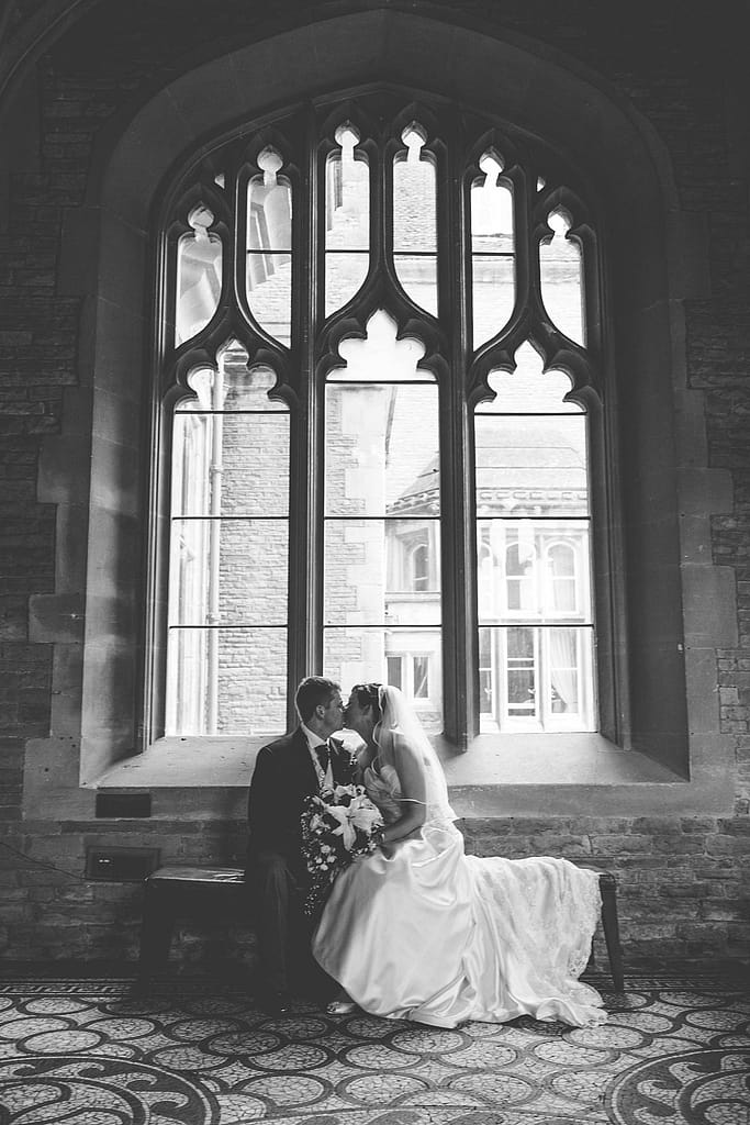 Tortworth court bride and groom kissing for wedding photographer