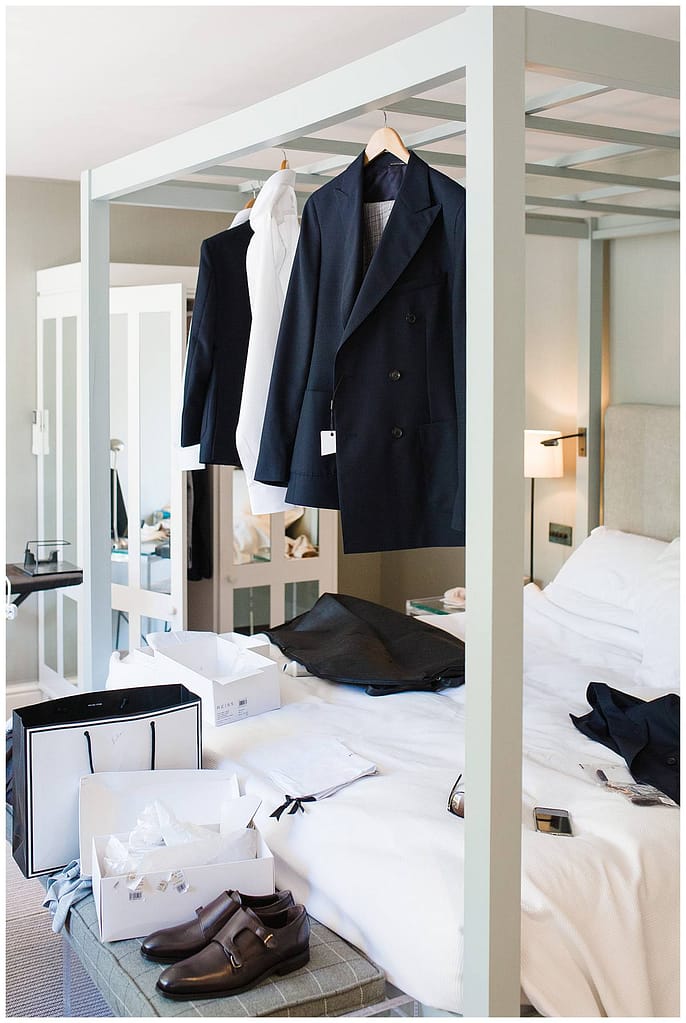 groom suit hanging in suite Barnsley house photographer