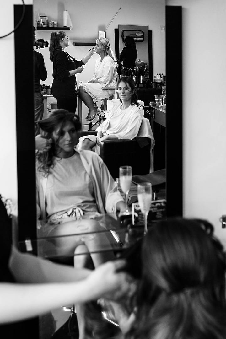 hairdresser with bridal party wedding