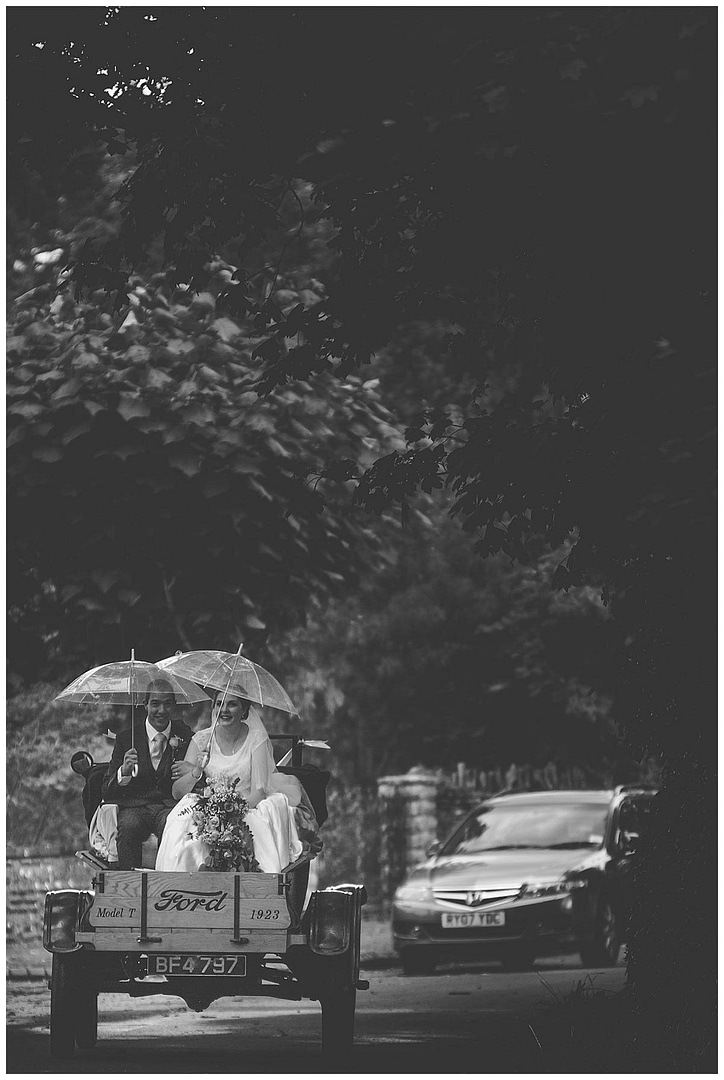 couple in truck gloucestershire wedding photography
