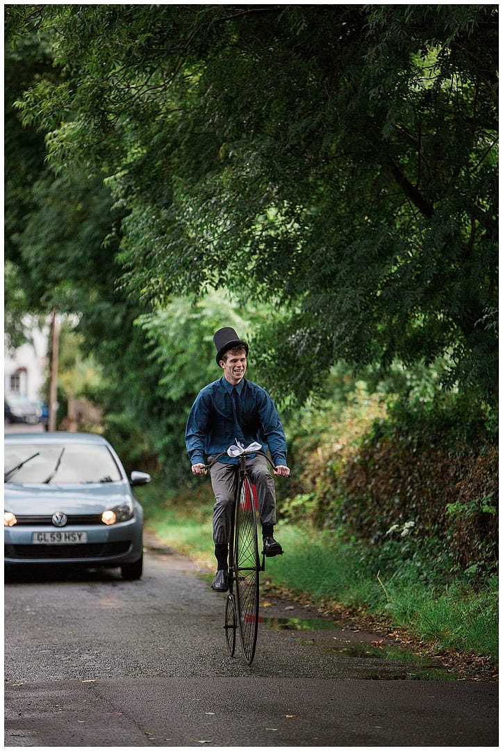 man on bike rustic gloucestershire wedding photography